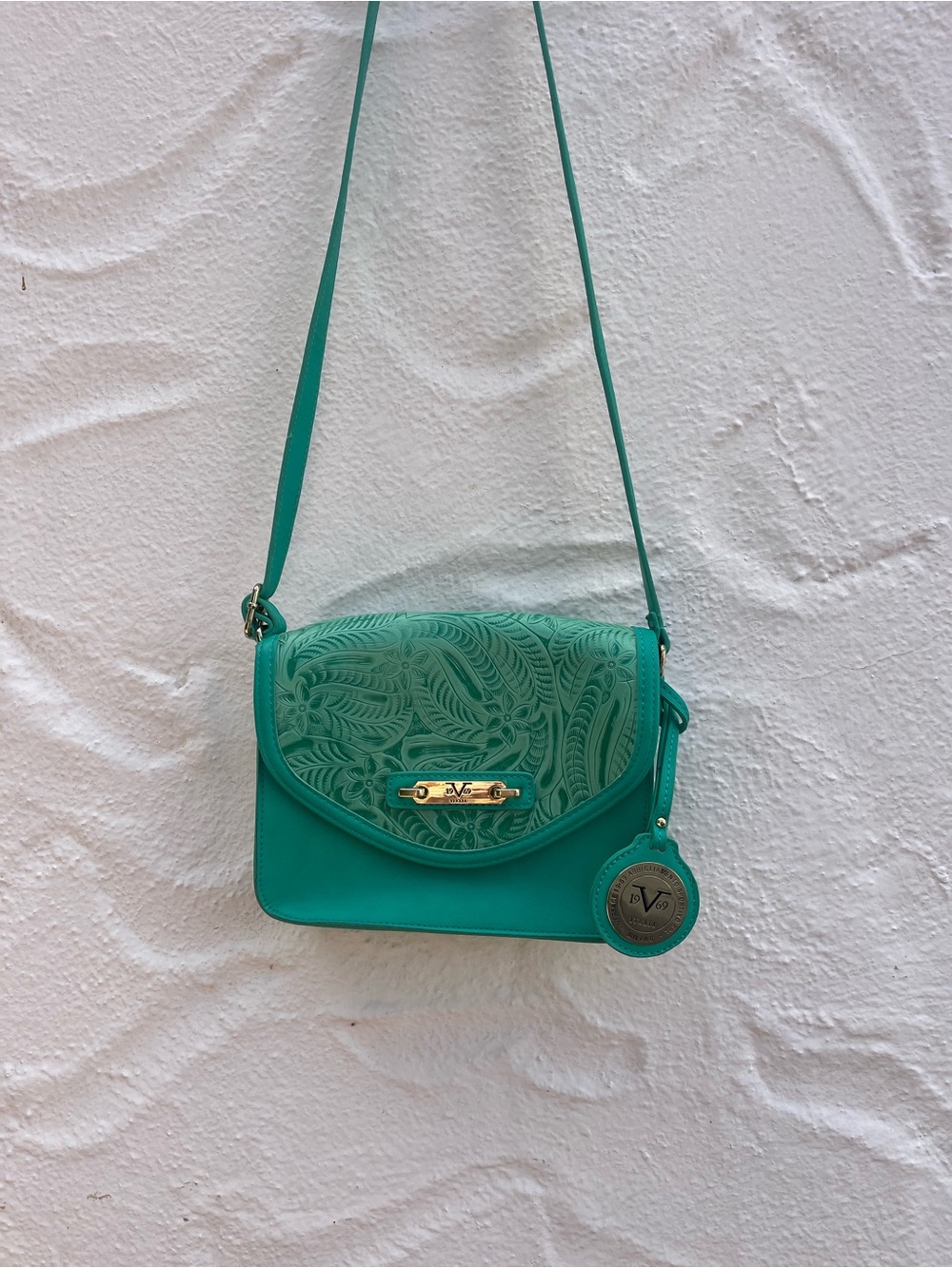 Vintage Versace crossbody purse, turquoise embossed leather, rare color